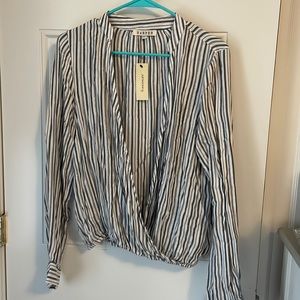 Francesca’s button down. Never worn. Size M. Blue & white stripped w/silver.